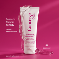 Conceive Plus fertility lubricant tube on a pink background